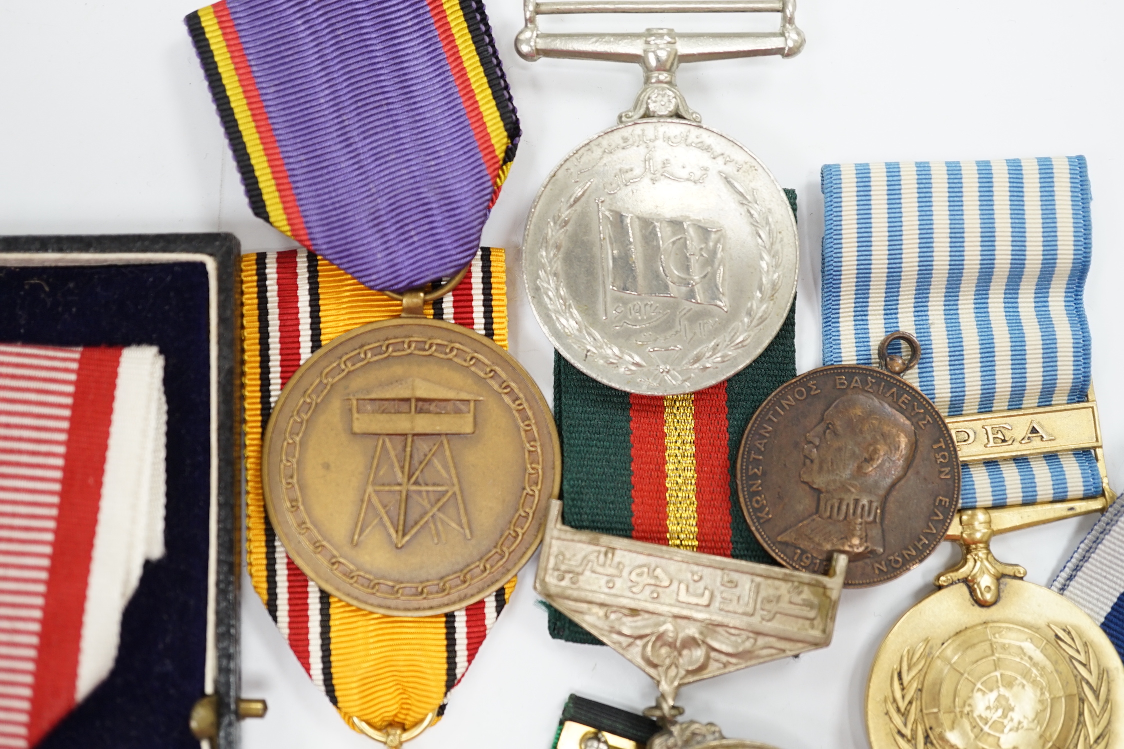 Thirty world military and commemorative medals including; a Belgium War Aid Medal 1914-18, Nigeria Republic Medal, Austri-Hungarian Medal for Bravery, Kuwaiti Liberation Medal, Pakistan Resolution Day Medal, etc.